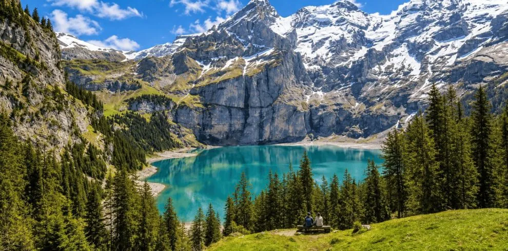 Hiking by a turquoise lake in the Swiss Alps